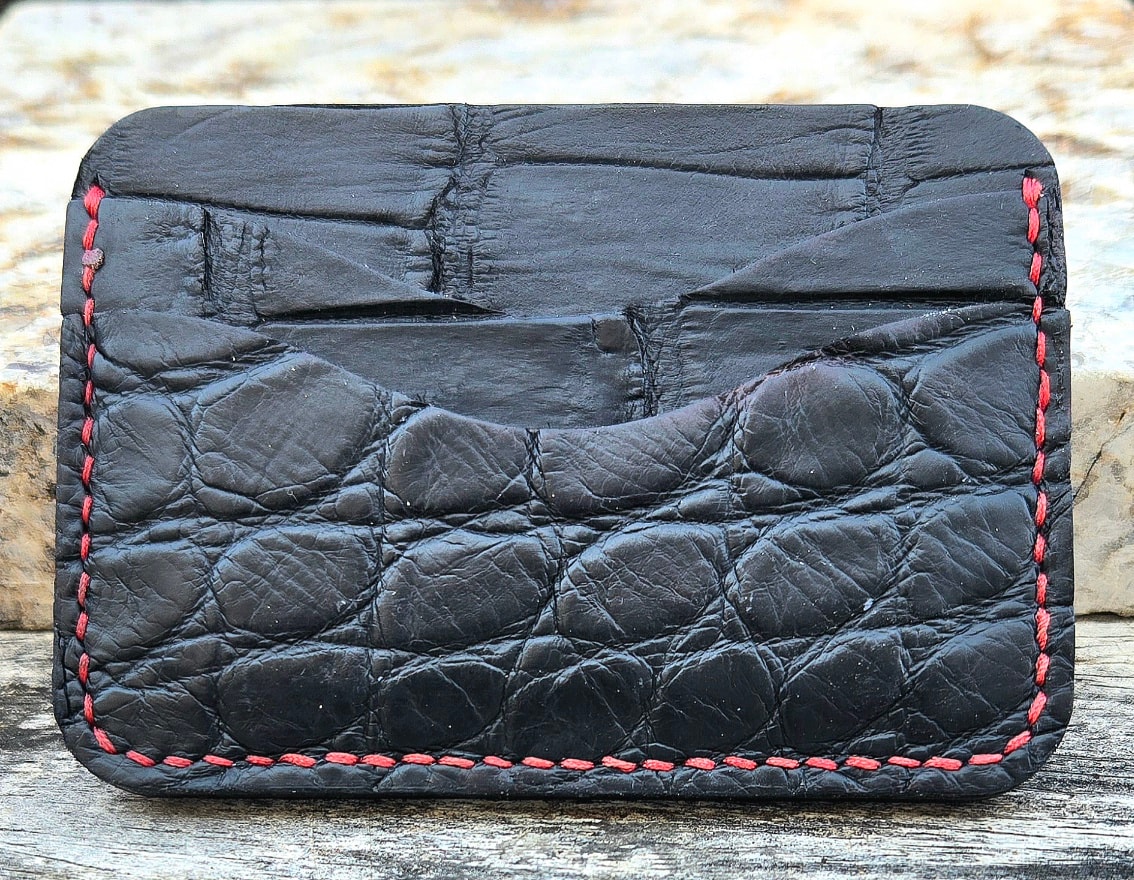 American alligator wallet — edge and spine detail