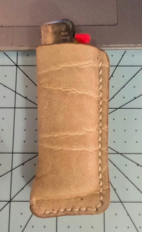 Ivory elephant lighter case — front view with lighter