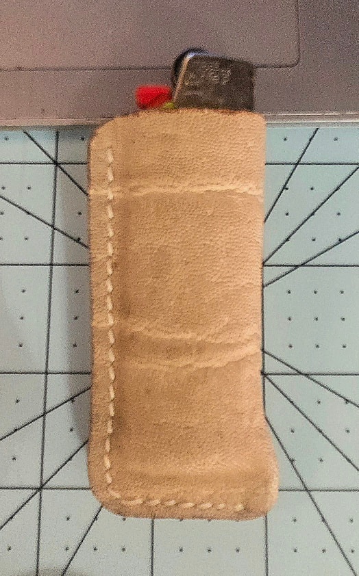 Ivory elephant lighter case — back view with lighter