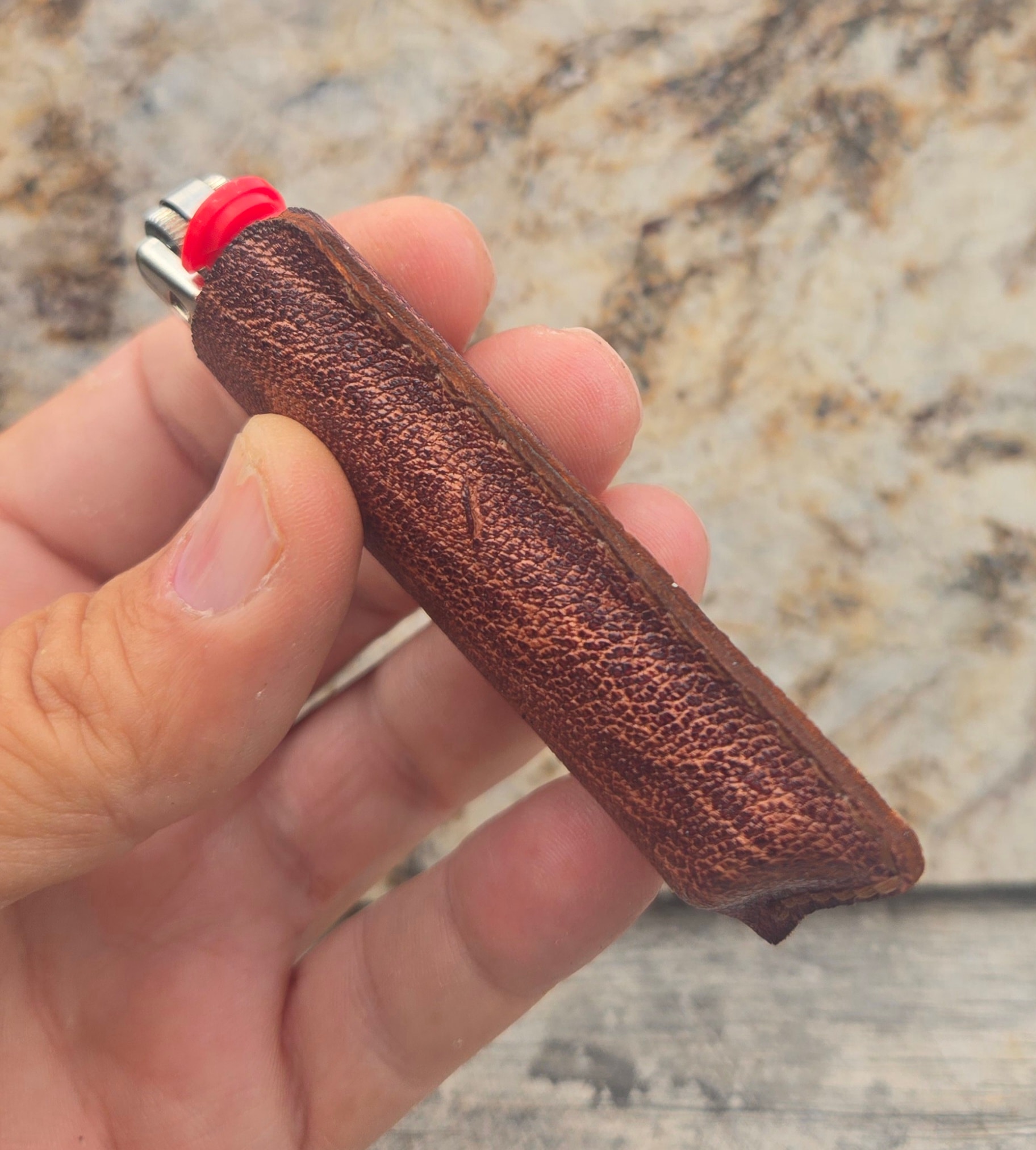 African goat lighter case — edge and profile detail