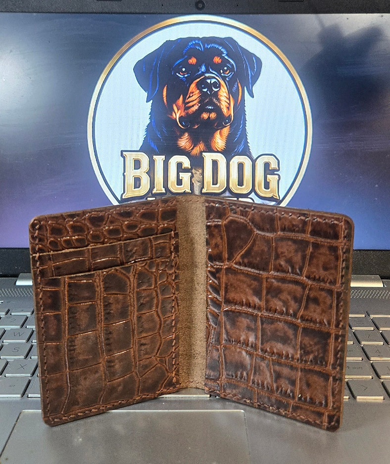 XL1 Mauri croc embossed bifold — interior open, empty